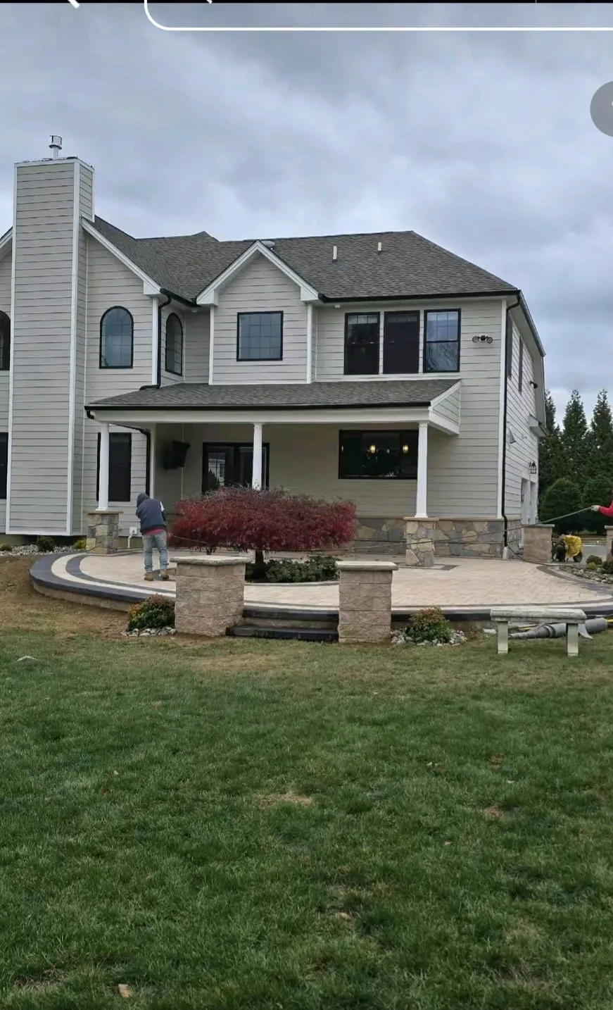 Compacted stone base under a paver patio in New Jersey