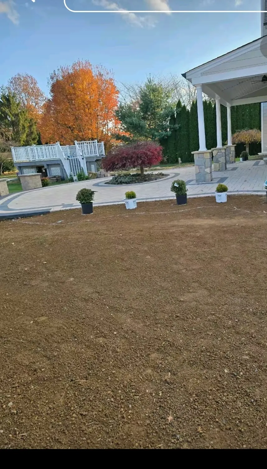 Compacted angular stone base for a paver patio