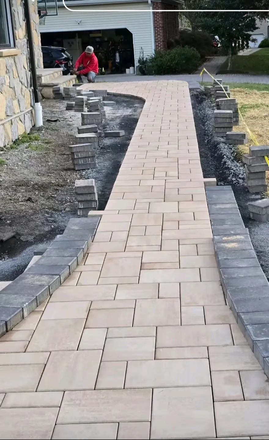 Pavers lifted for a base repair in New Jersey